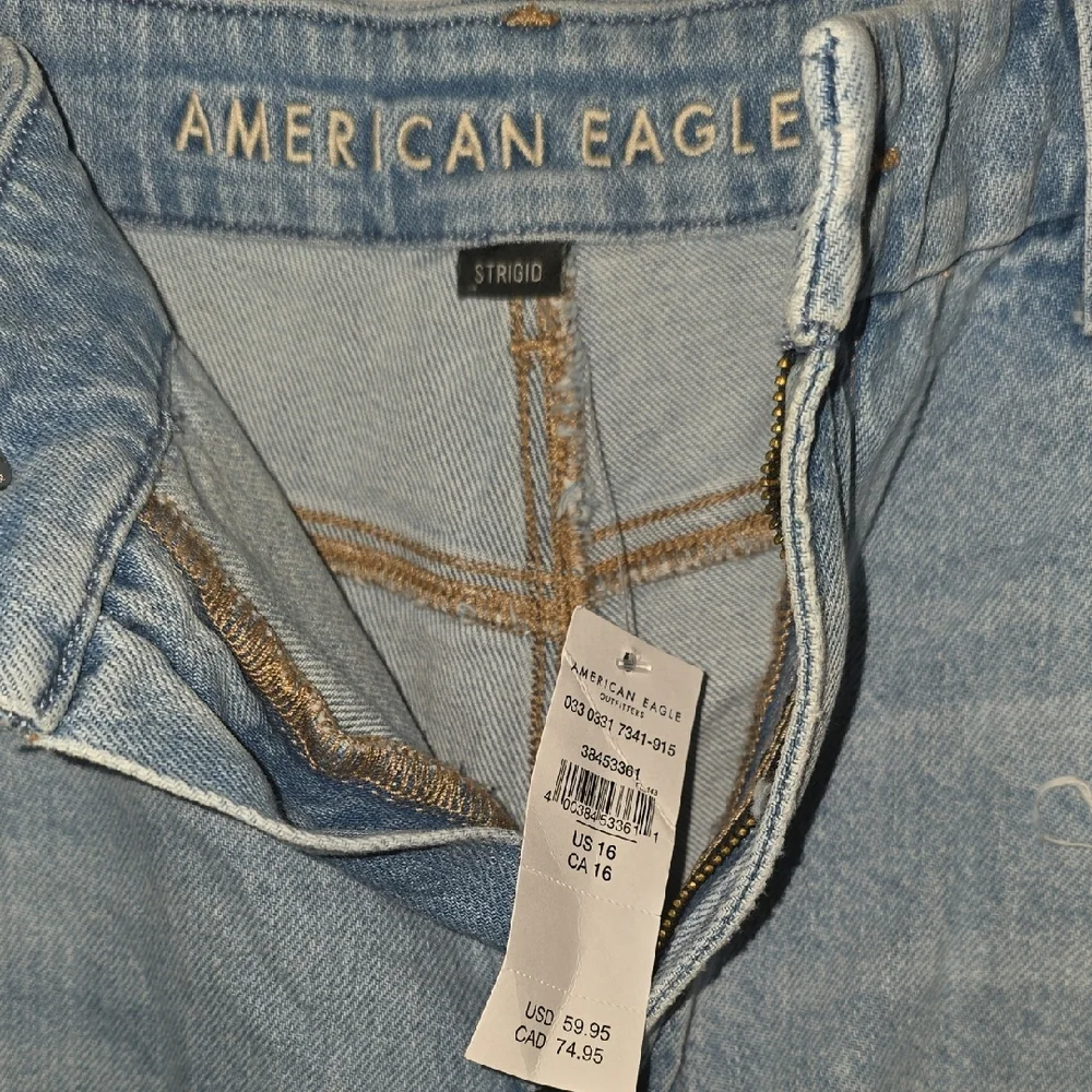 American Eagle Outfitters Light Blue Ripped Jean Shorts - Picture 2 of 4